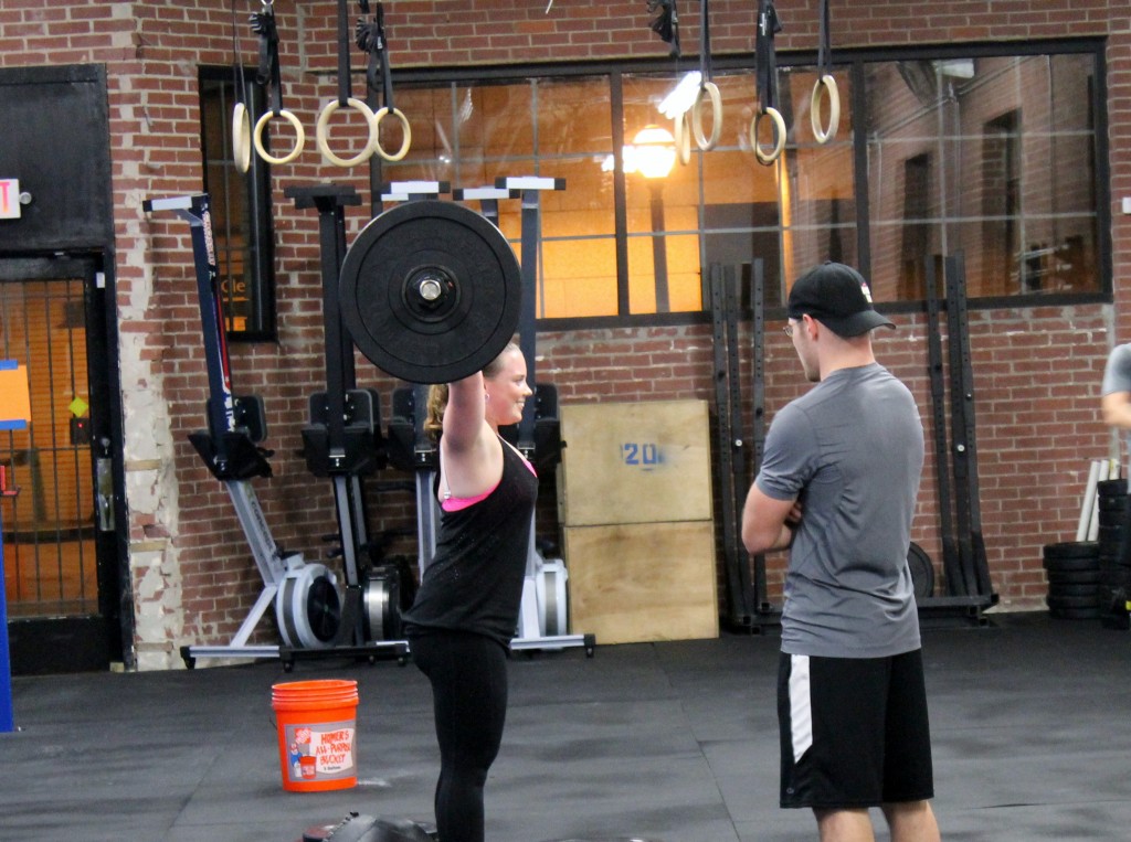 Clare working on her overhead squat with Coach Casey