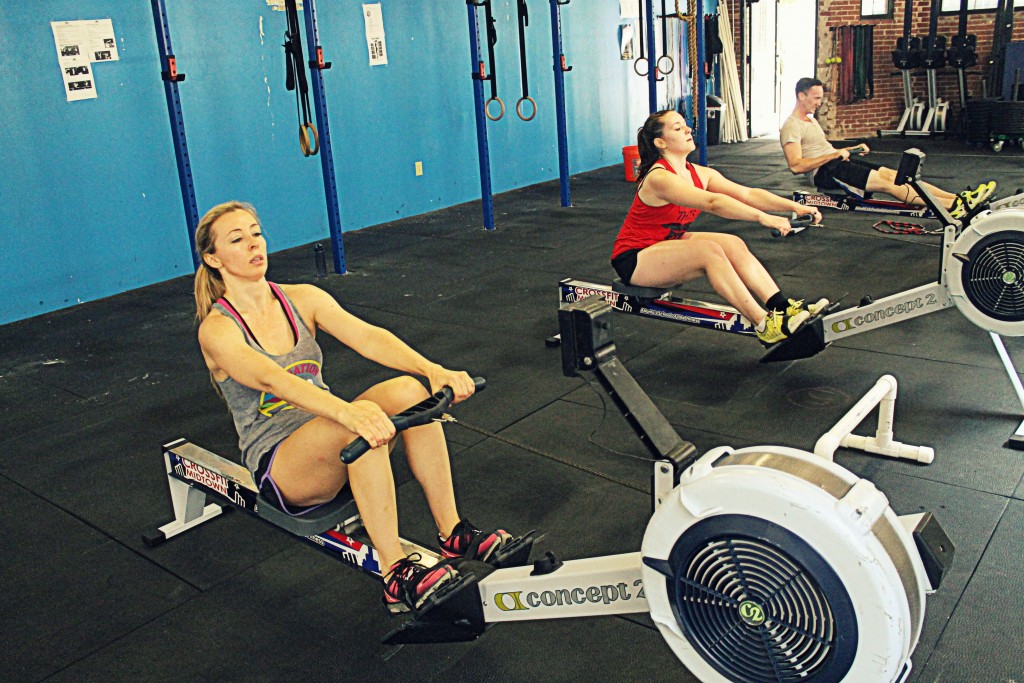 Monica, Maria, and Patrick on Tabata intervals on the rower. Feel the burn.