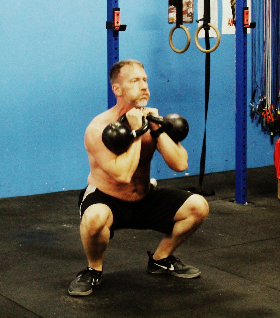 Keepin' the bells in the pockets. David H kettlebell thruster. 