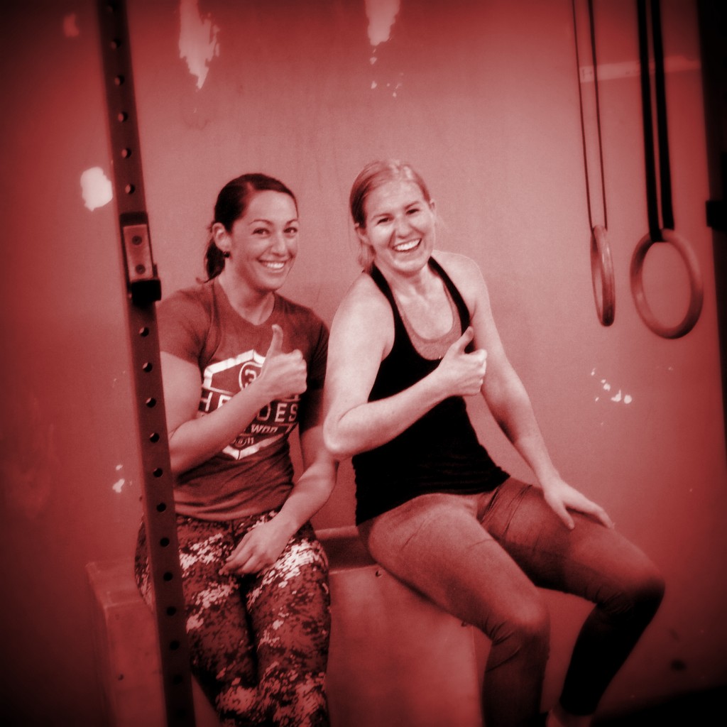 Lauren and Elizabeth giving it a thumbs up for a WOD well done.